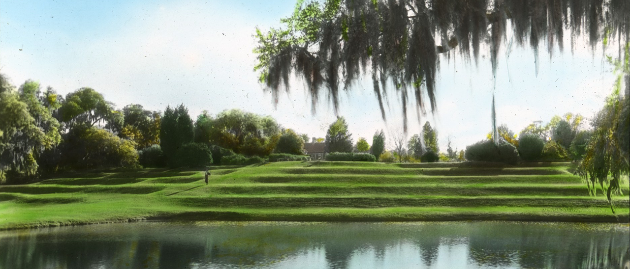 Terraced lawn by a pond