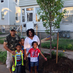 Ed and Greenspace volunteers prepare to plant a street tree. Urban Resources Initiative photo.