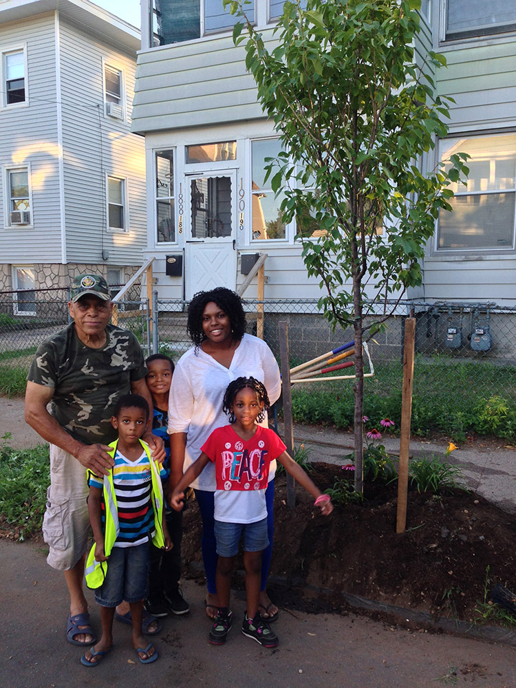 Ed and Greenspace volunteers prepare to plant a street tree. Urban Resources Initiative photo.