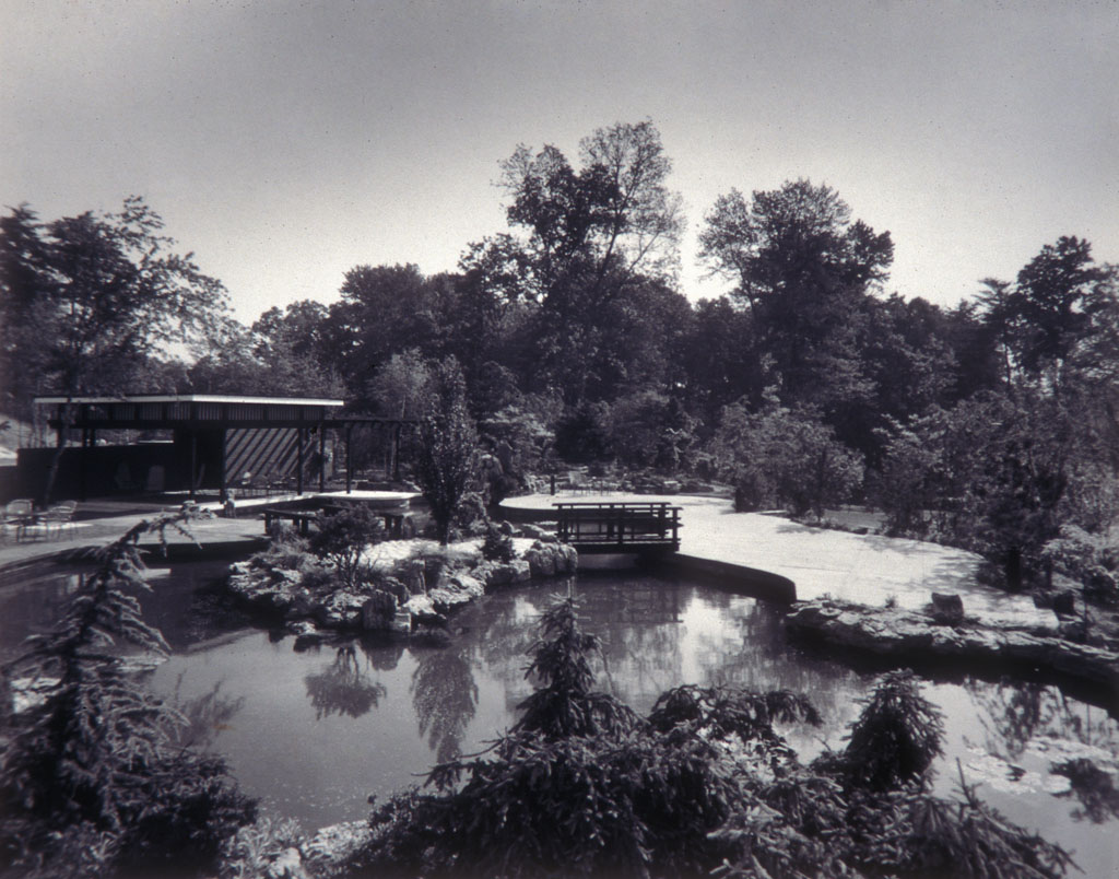 Free-form pond and patio in the gardens of Capitol Car Distributors in Lanham, Maryland. Stewart Brothers, photographers, circa 1966. Smithsonian Institution, Archives of American Gardens, Garden Club of America Collection.