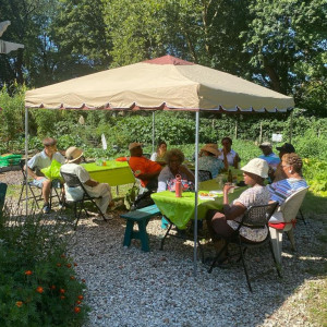 2021 photo of gardeners at the cookout at the Awbury Community Garden