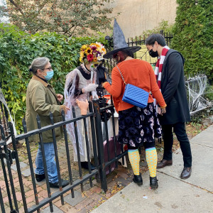 2022 photo of neighbors celebrating Halloween during the COVID-19 pandemic at the Fitzwater 2000 Community Garden