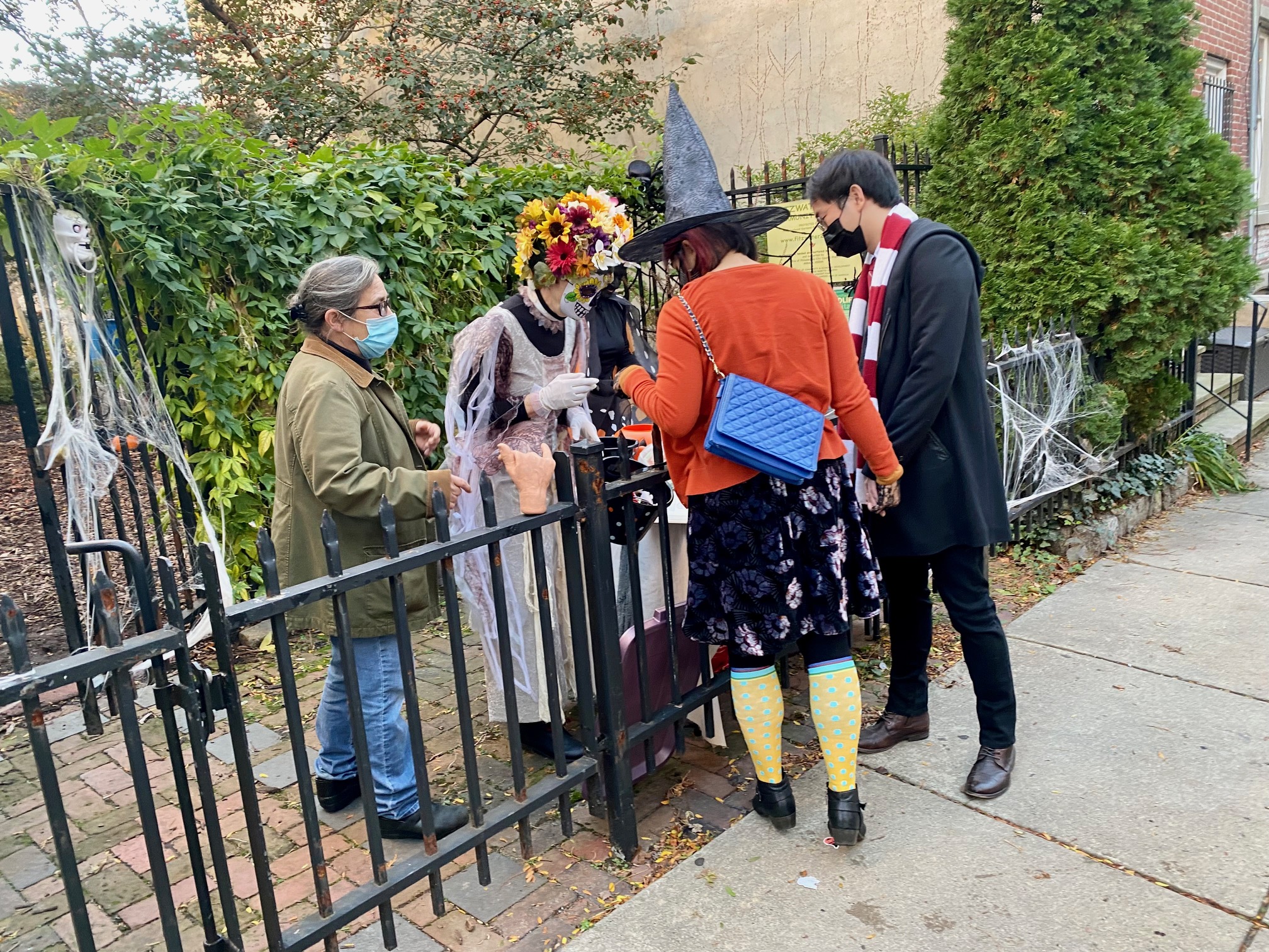 2022 photo of neighbors celebrating Halloween during the COVID-19 pandemic at the Fitzwater 2000 Community Garden