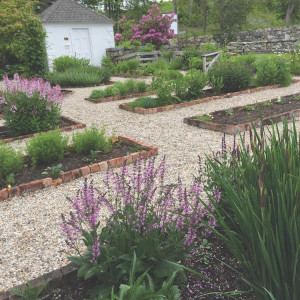 The space was formerly an herb garden maintained by the Millbrook Garden Club.