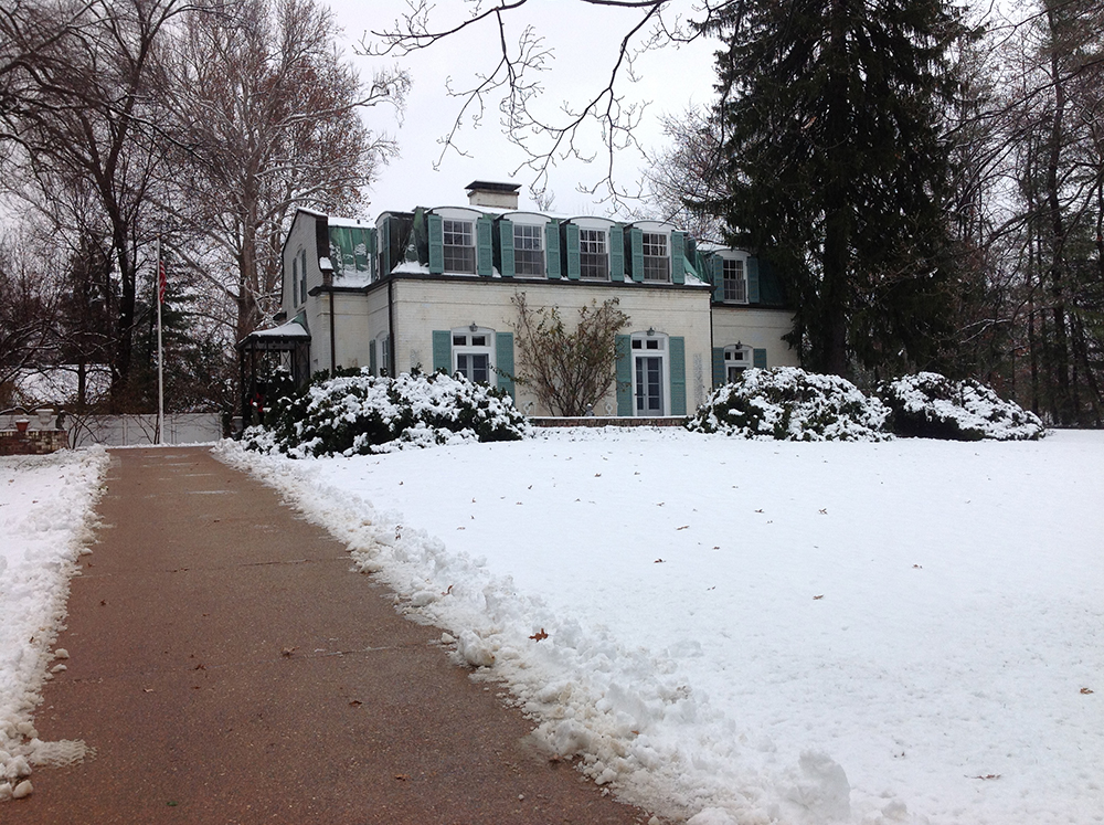 Winter view of the residence from the property entrance.