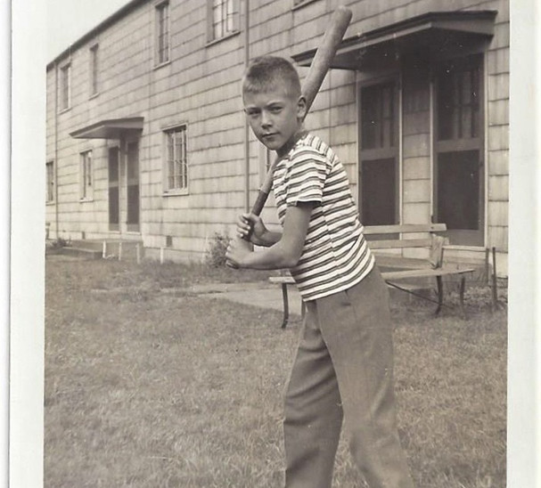 The author, Fred, outside of his apartment building, the Burns Heights housing project, a barracks style development originally designed for military housing, in Duquesne, Pennsylvania.