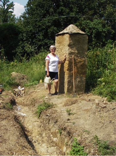 Adventures in Gardening: Highlights from a Garden Tinkerer. Dorothy and her cob obelisk.