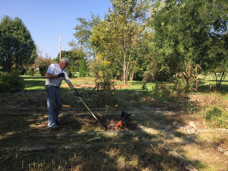 Dad could always be found Planning yet another garden bed.