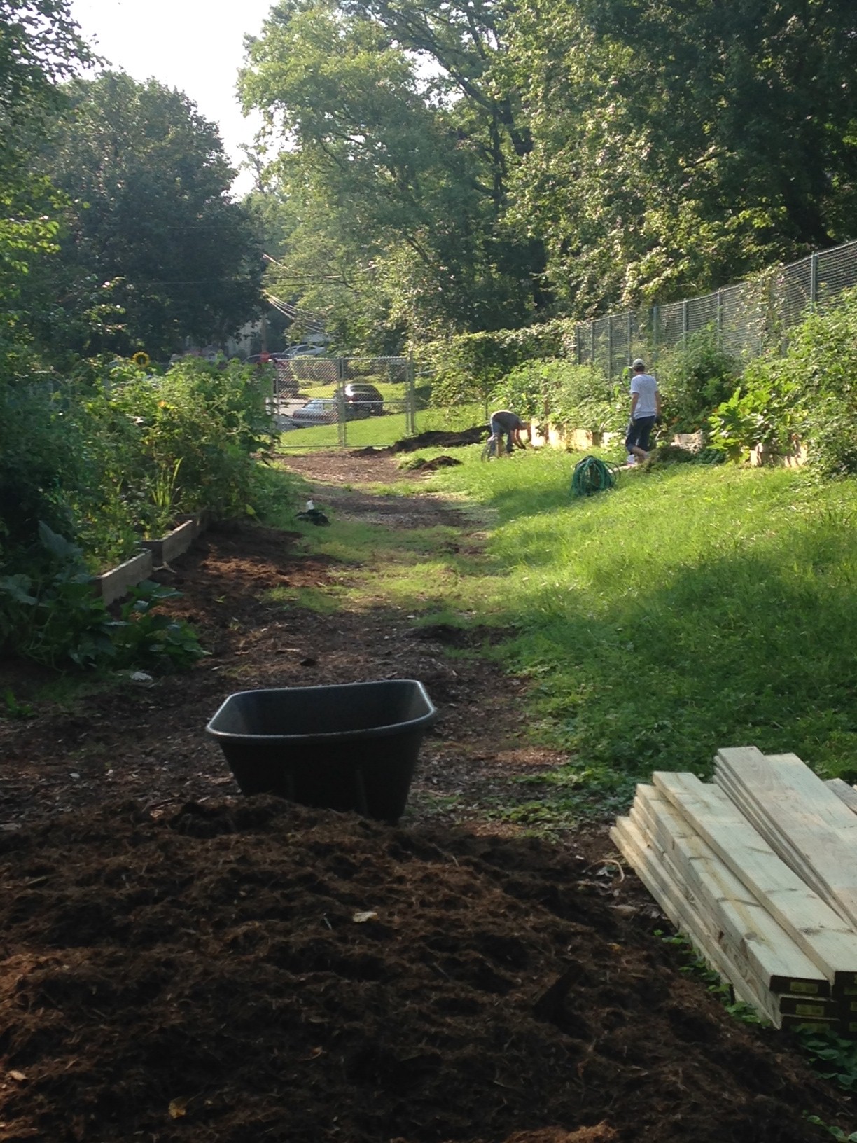 Residents can rent plots to grow food, and some plots are reserved for community education.