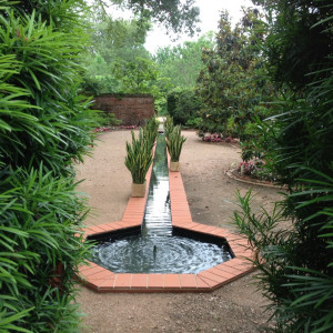 The Walled Garden is presently planted as a flower and herb garden in two concentric circles at the Longue Vue House and Gardens, New Orleans, LA. During WWII, the Sterns planted it as a Victory Garden of vegetables to feed family and friends. Photographer: Amy Graham