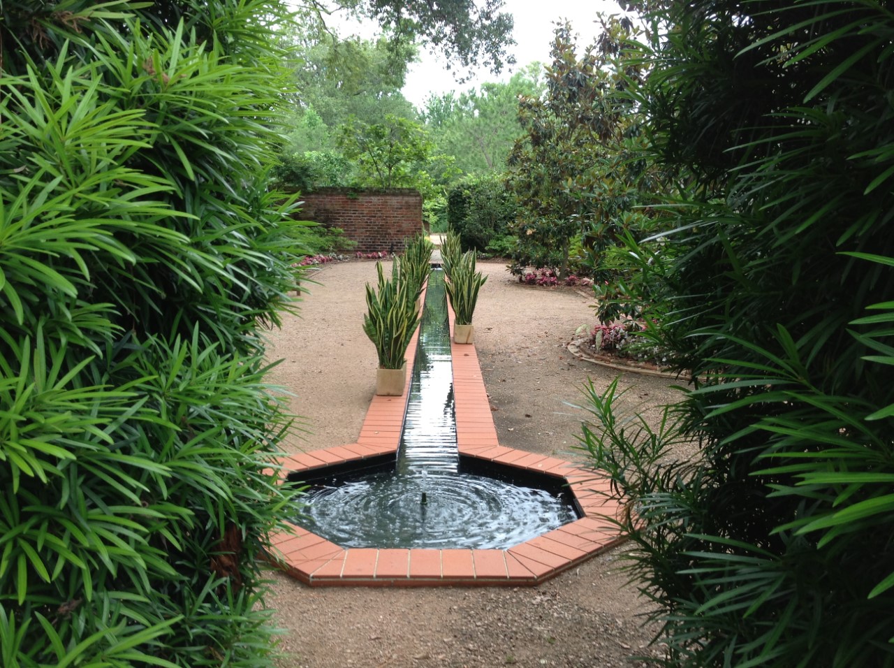 The Walled Garden is presently planted as a flower and herb garden in two concentric circles at the Longue Vue House and Gardens, New Orleans, LA. During WWII, the Sterns planted it as a Victory Garden of vegetables to feed family and friends. Photographer: Amy Graham