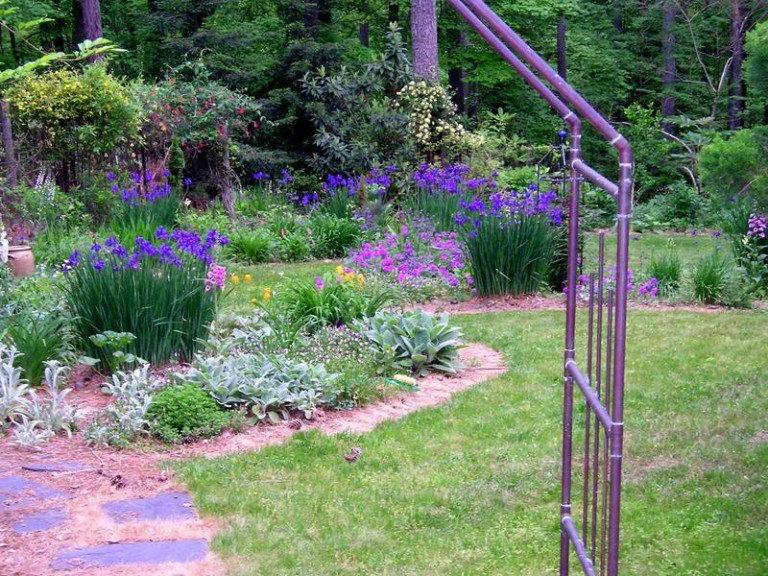 The perennial garden, viewed through a copper arbor at the entrance, May 1, 2004.