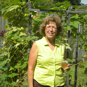 Susan's granddaughter waters the garden.