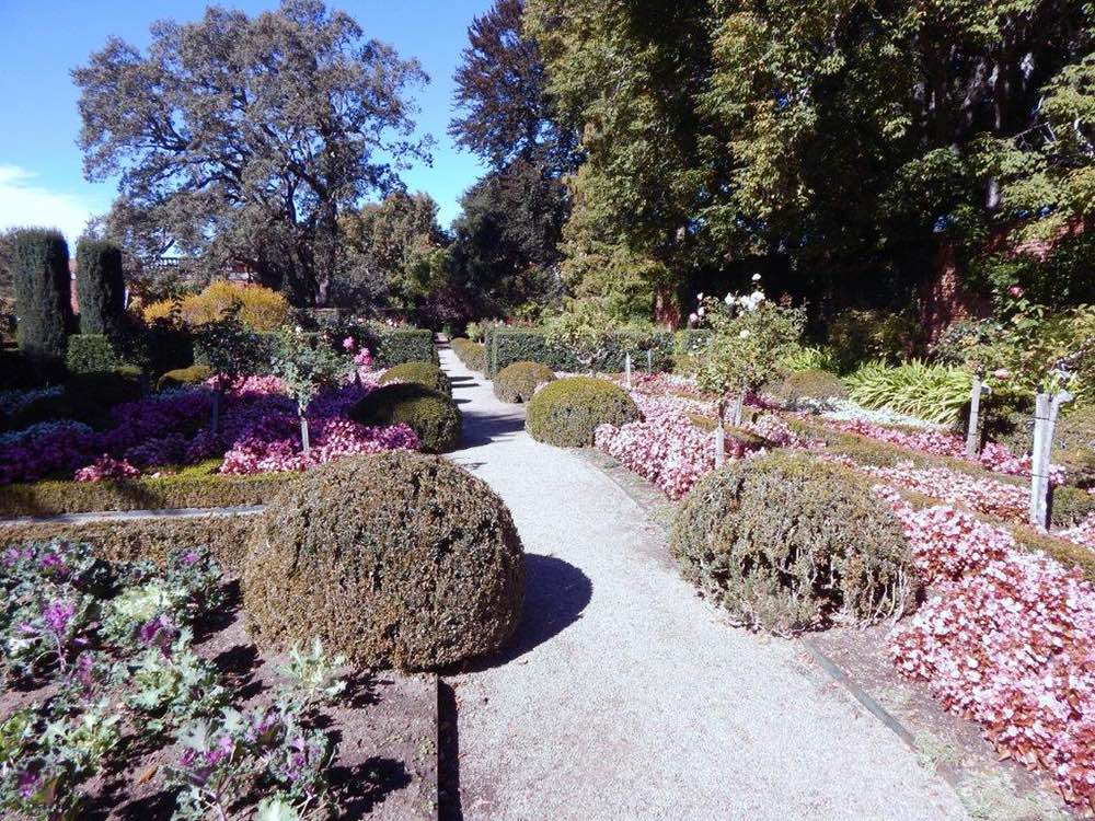 A view of a formal garden pathway at Fioli.