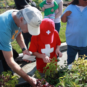 Bonnie teaching children in the UpGarden PPatch,